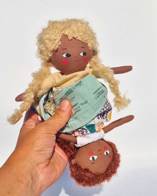 Handmade midsize reversible fabric doll with blonde hair on one side and brown curly hair on the other, by Molli & Moai