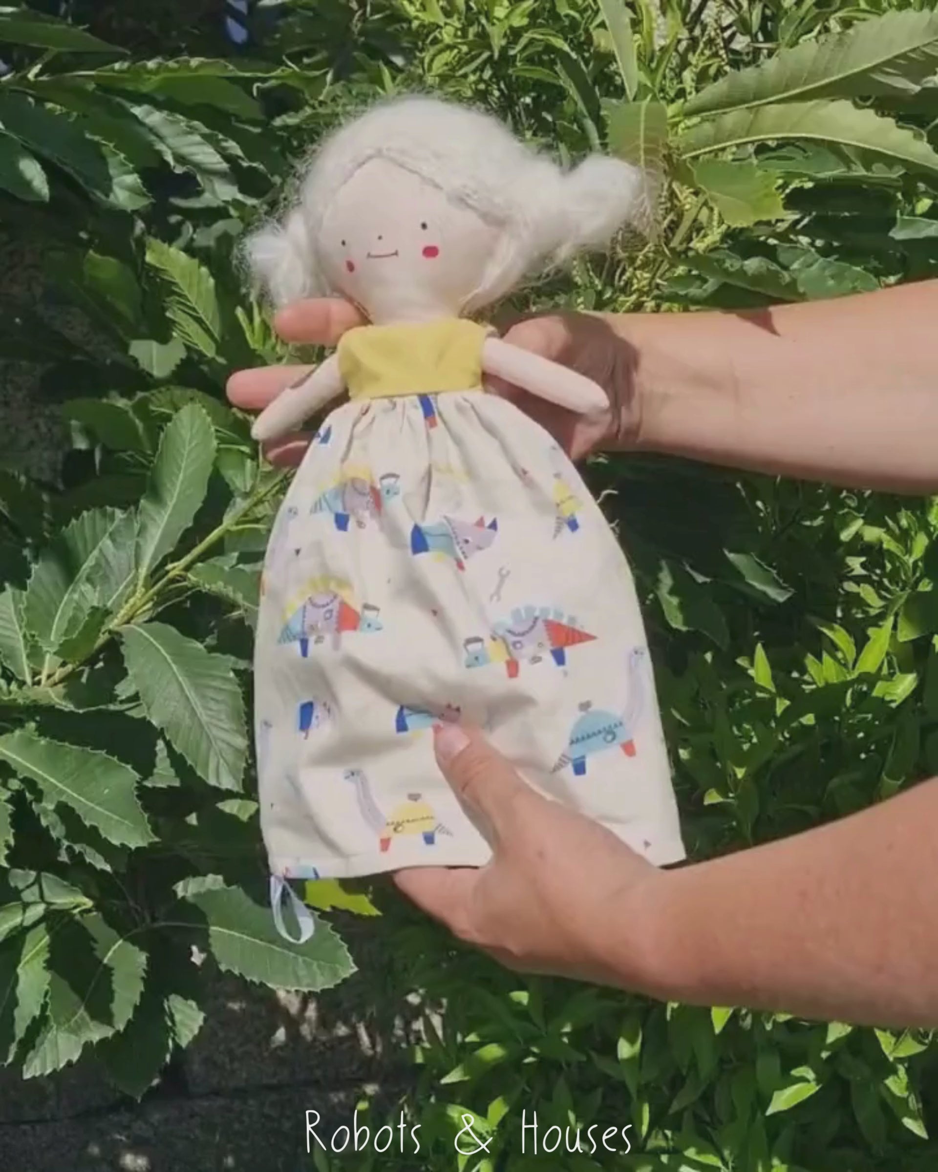 Video showing how the Robots & Houses reversible handmade doll flips to reveal the second character